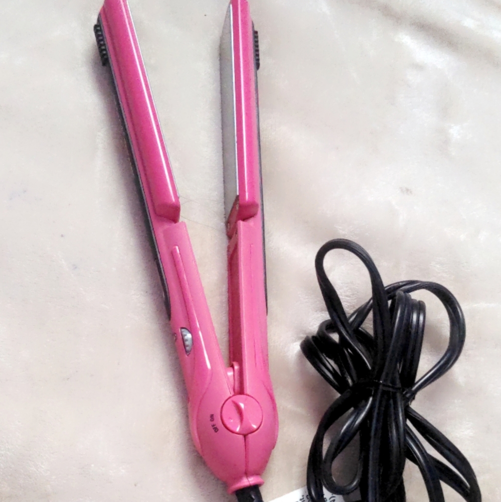 Pink Revlon Ceramic hair straightener